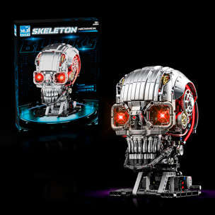 Maqueta 3D mecanizada de calabera con 1099 piezas, equipada con luces y mecanismo de manivela que permite movimiento dinámico.