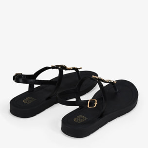 Sandalias de dedo negras planas con aplique metálico