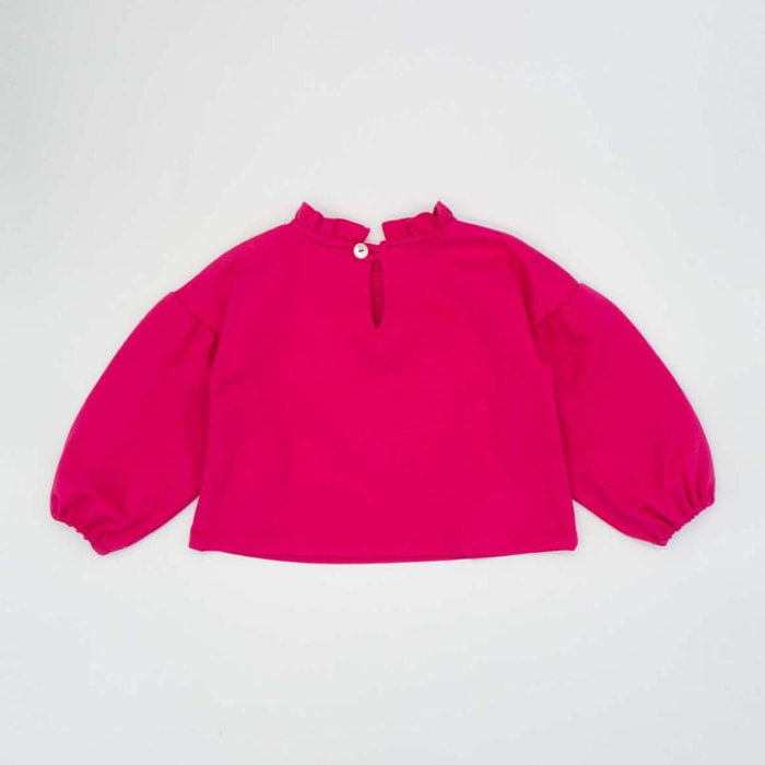 Blusa punto roma con corazón rosa