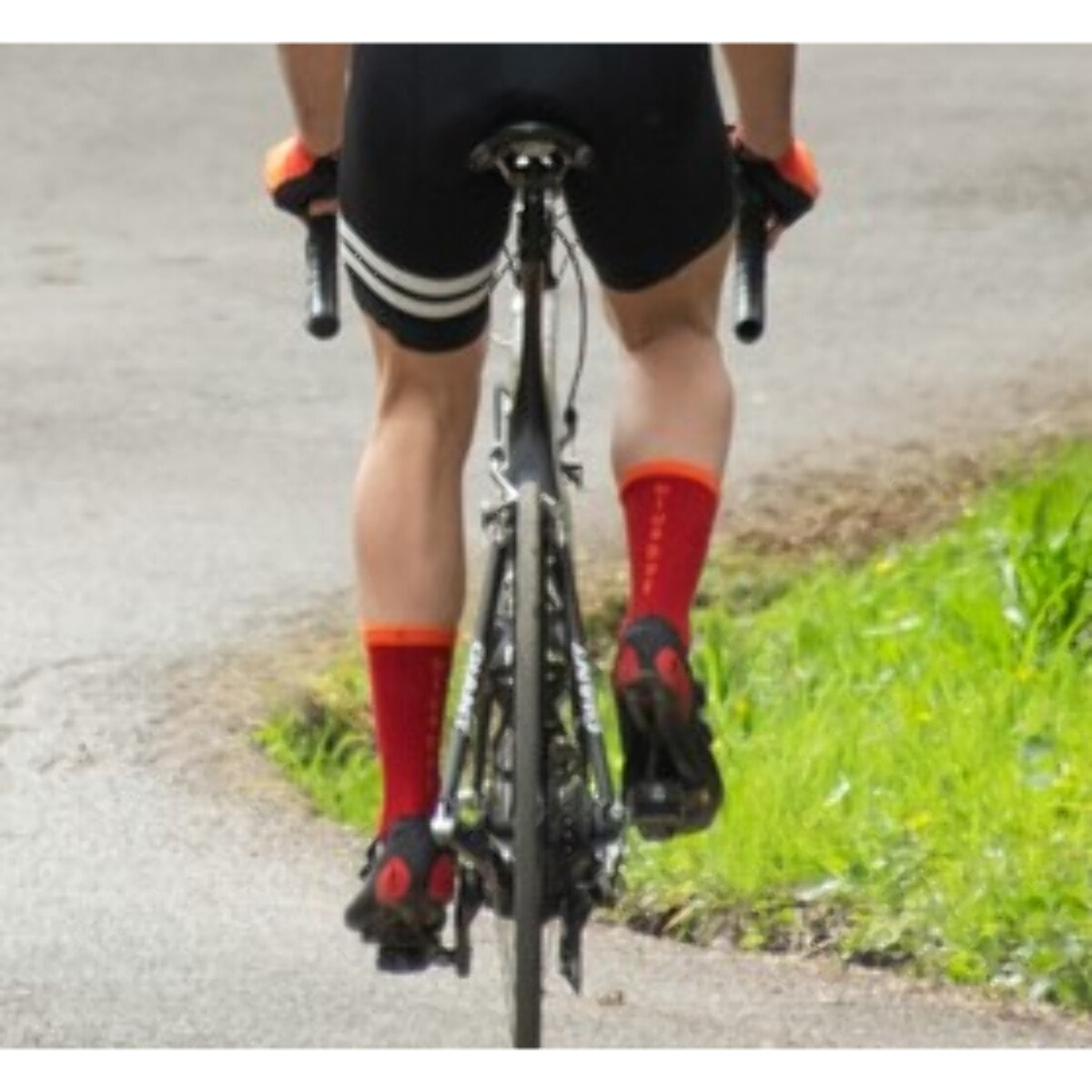 Calcetines de compresión unisex BLUEBALL Peloton - Rojo con línea naranja