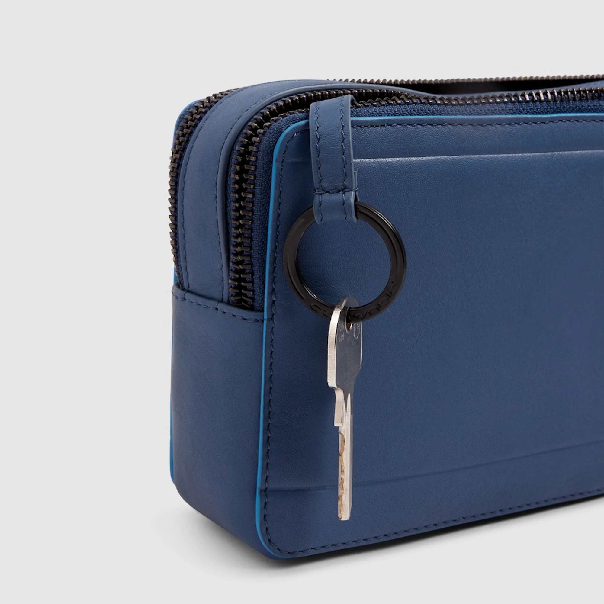 Piquadro Pochette in pelle a due scomparti con polsiera rimovibile