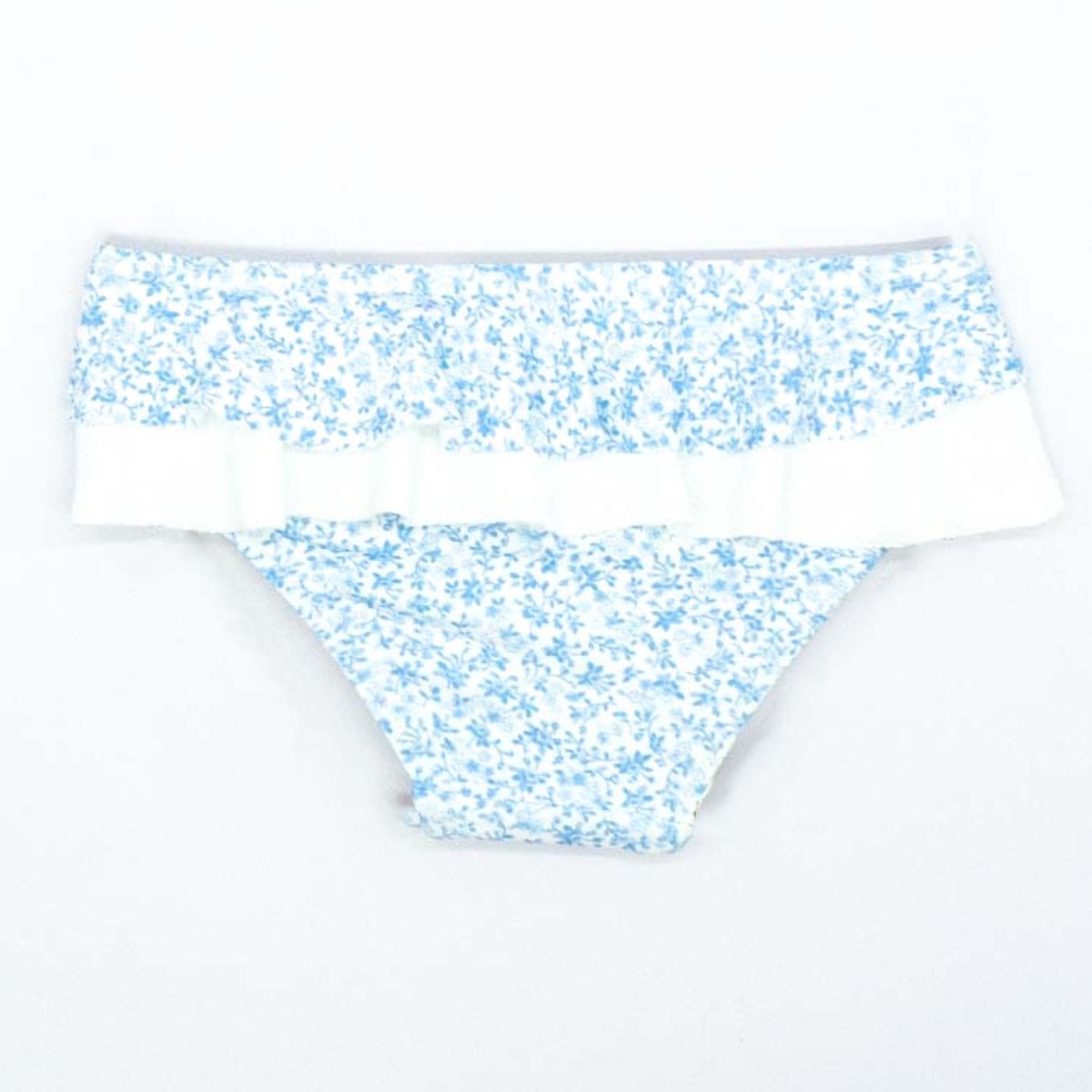 CULETÍN FLORECITAS AZULES CON VOLANTE Y LAZO BLANCO