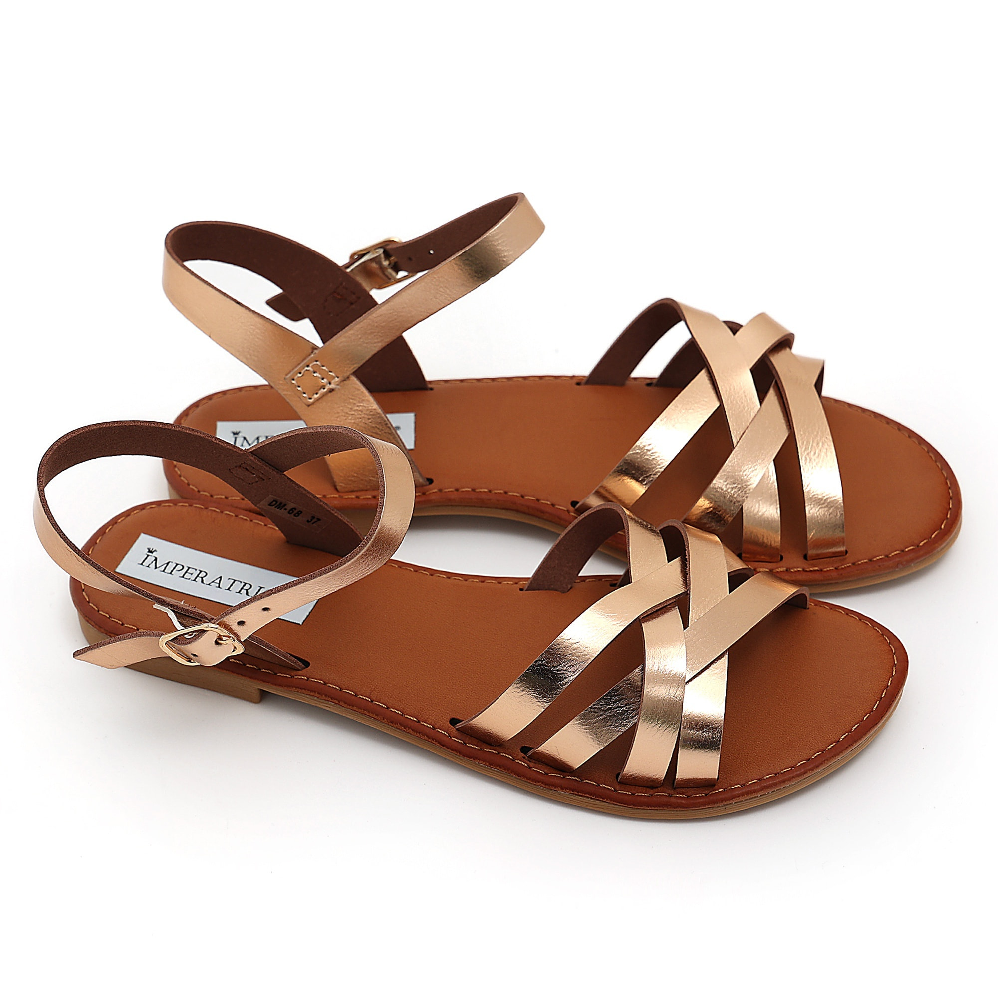 Sandali bassi in simil pelle con fasce incrociate