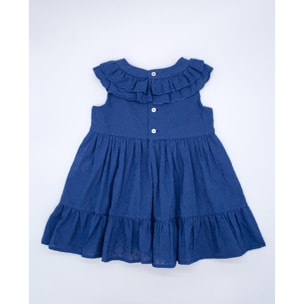 Vestido de voile bordado azul marino. De tirantes con doble volante en el cuello, falda fruncida con volante.