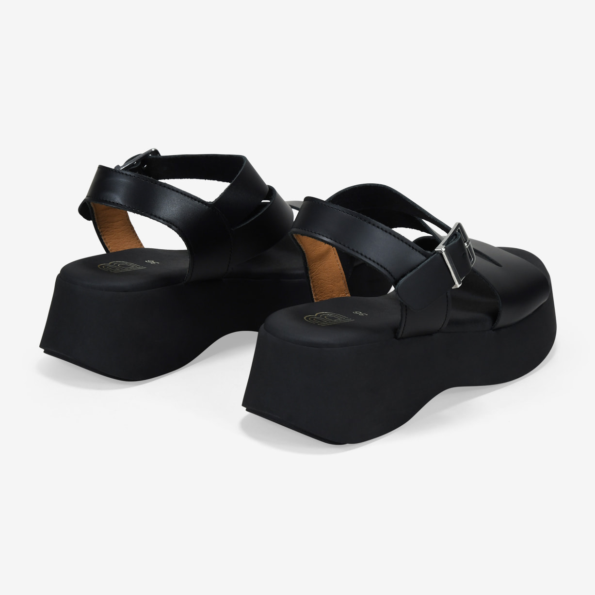 Sandalias de plataforma negras en piel