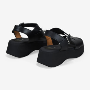 Sandalias de plataforma negras en piel