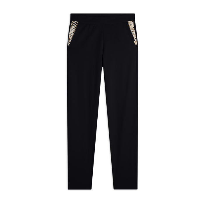 Pantaloni in jersey con apertura tasche animalier