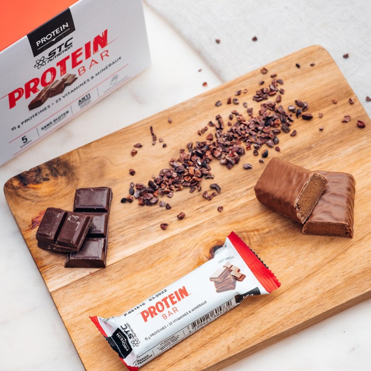 STC NUTRITION - Protein Bar - Barre protéinée enrichie en vitamines & minéraux - Maintien de la masse musculaire - Chocolat - 14g de protéines par barre - Etui de 5 barres