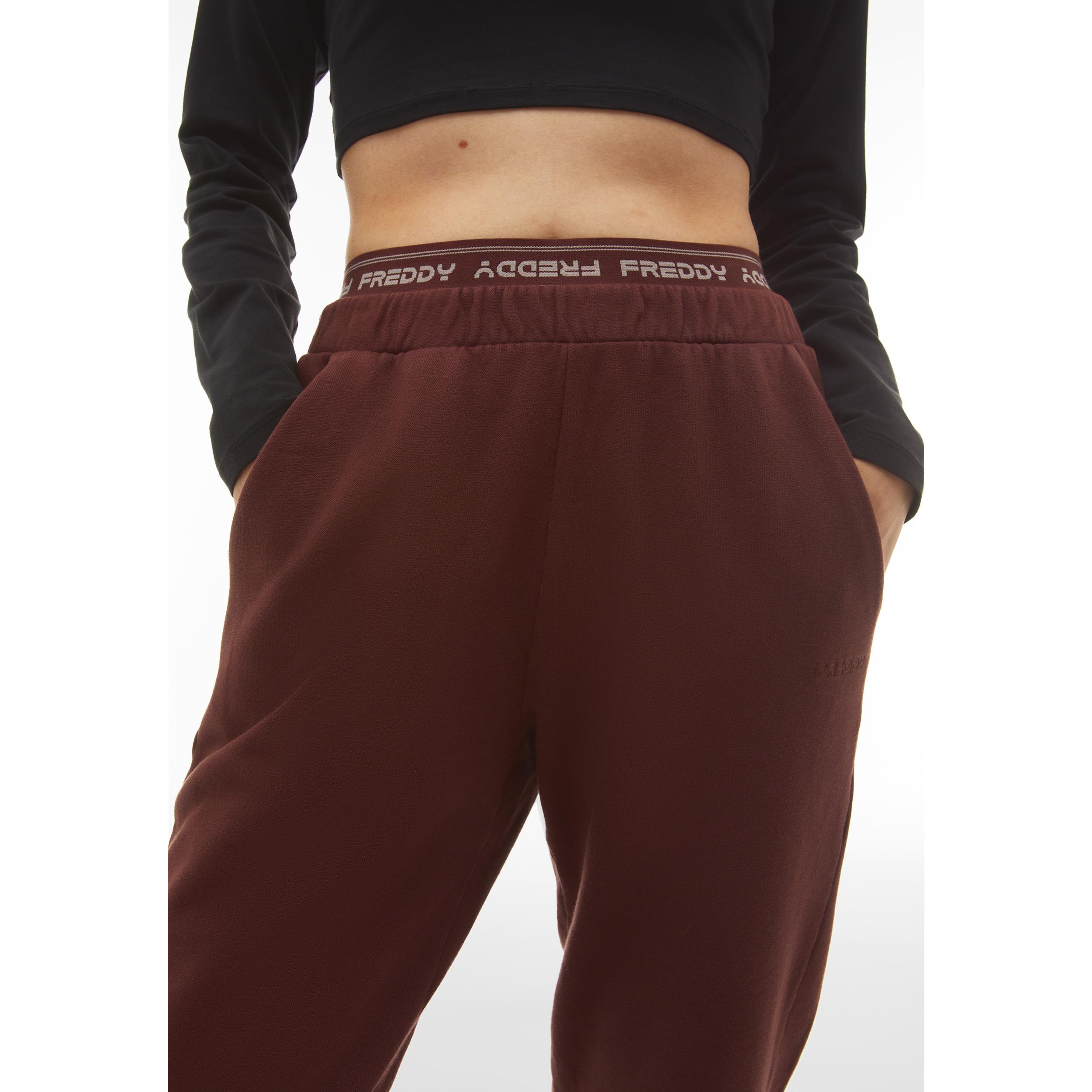 Pantaloni joggers in felpa invernale con elastico logato