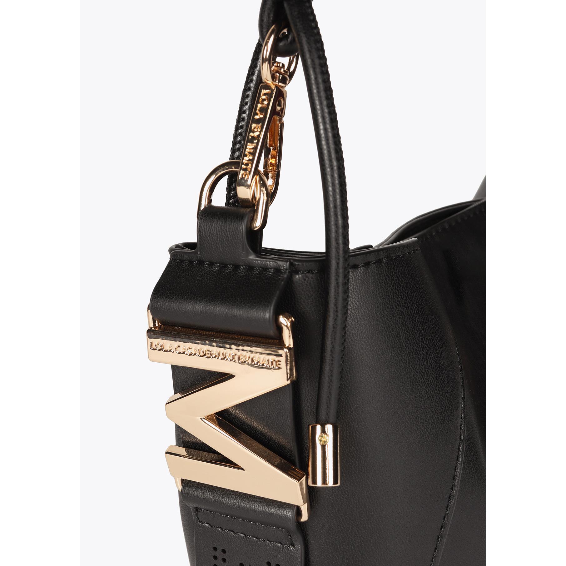 Borsa con manico intrecciato effetto pelle