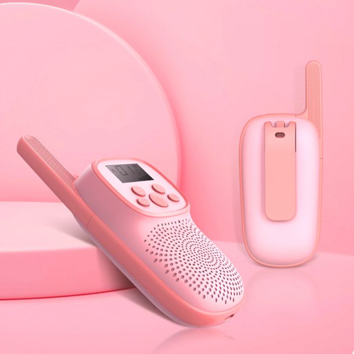 DAM Walkie Talkies infantiles D21, 1-3 km, pantalla de 1,5 LCD, 99 códigos de grupo encriptados, luz LED. 2 unidades. Batería recargable. 5,5x3,5x13,5 Cm. Color: Rosa