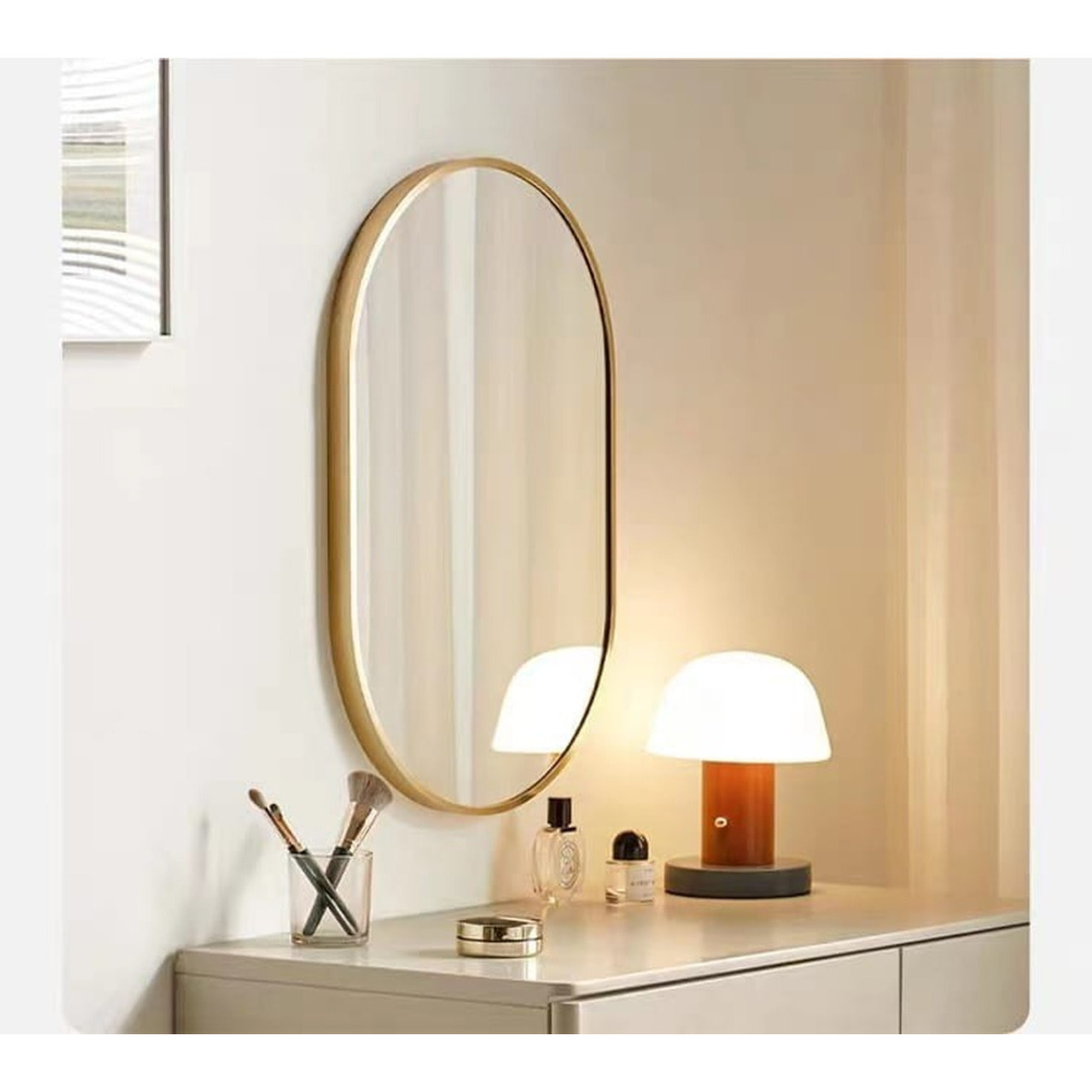 Specchio ovale con cornice dorata 100x50 cm