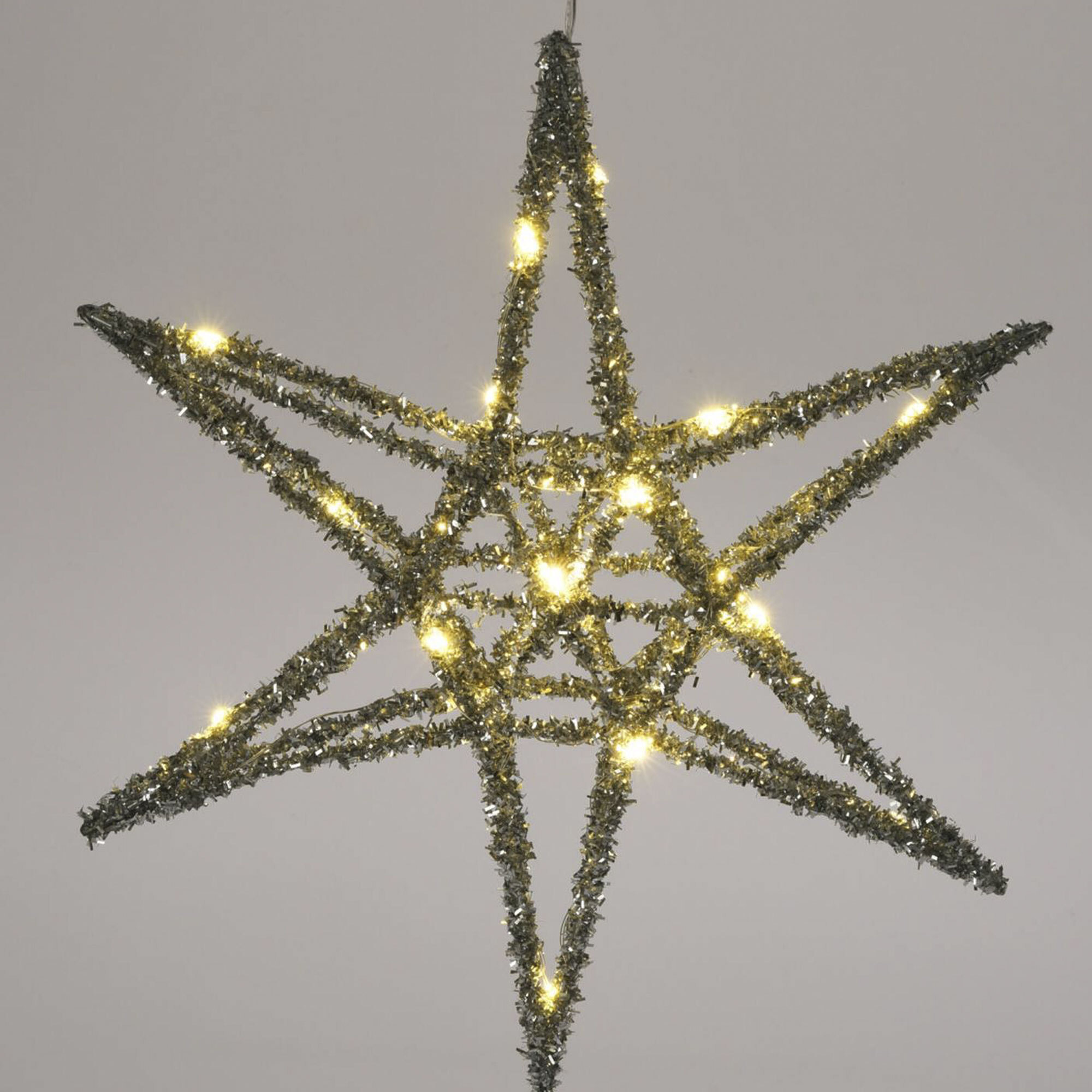 estrella navideña color plateado con 20 luces led blancas 30x5x30cm