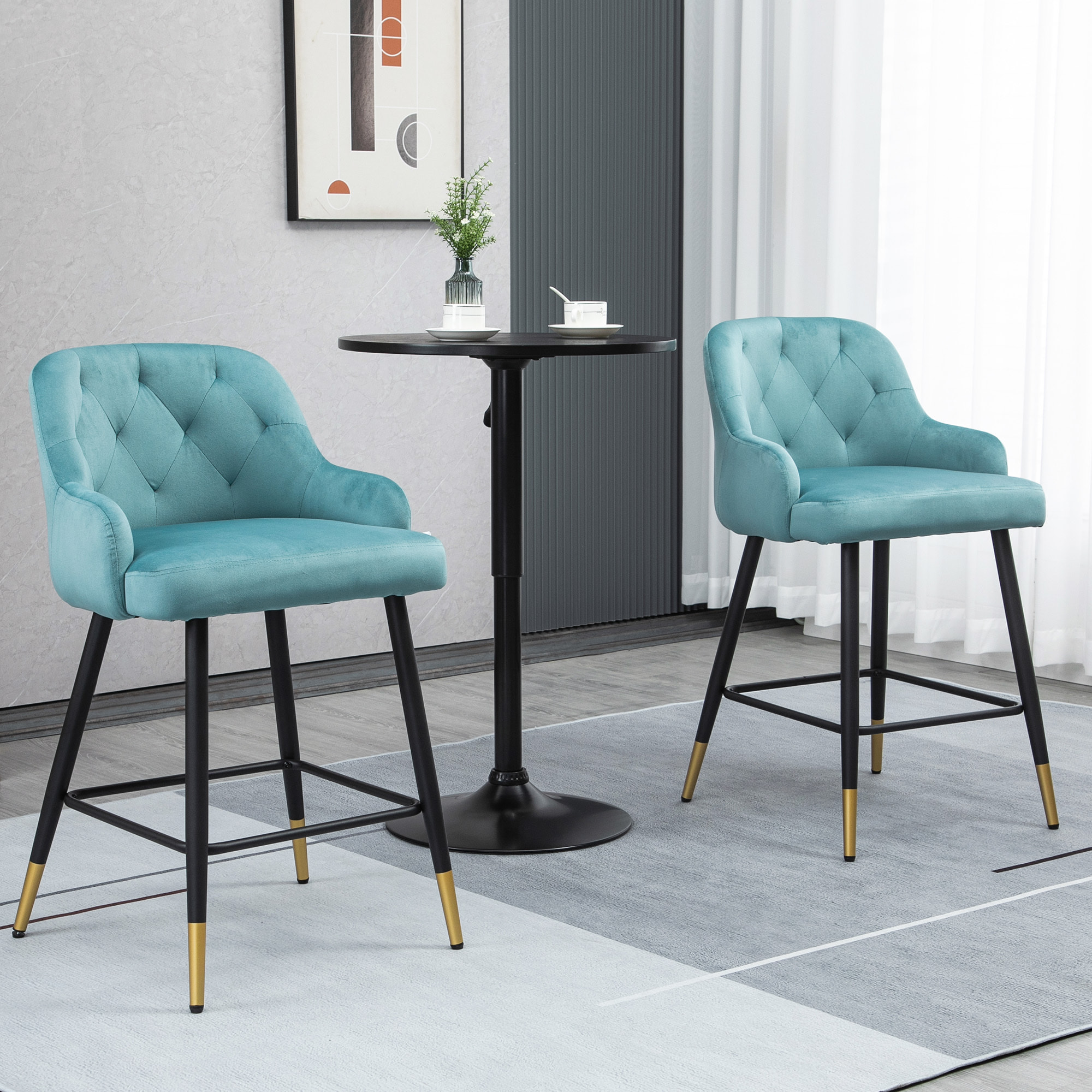 Lot de 2 tabourets de bar design Chesterfield effet capitonné piètement métal effilé noir extrémités dorées repose-pied aspect velours bleu