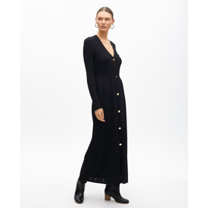 Abito in maglia con bottoni e gonna a trapezio