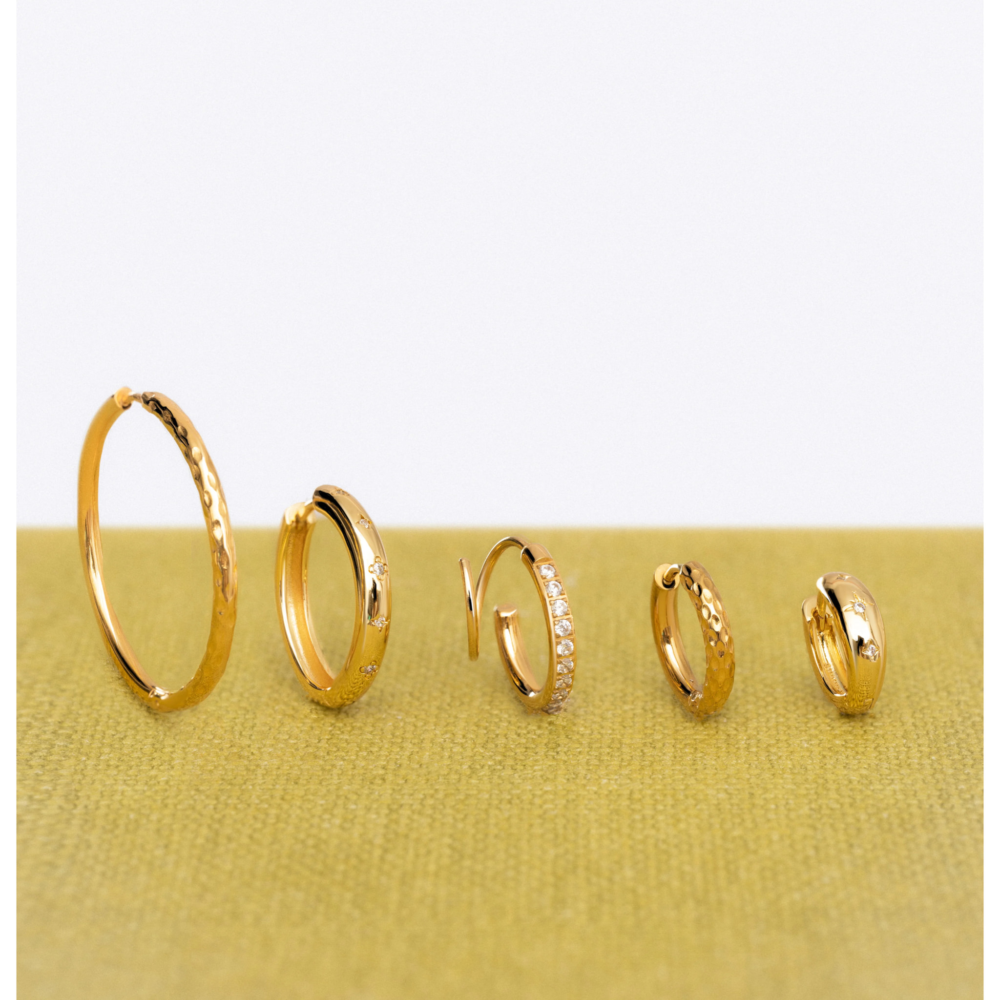 Orecchini Swirl  in Acciaio Placcato Oro