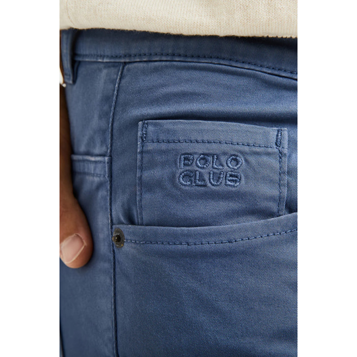 Pantalón azul denim de cinco bolsillos con logo bordado