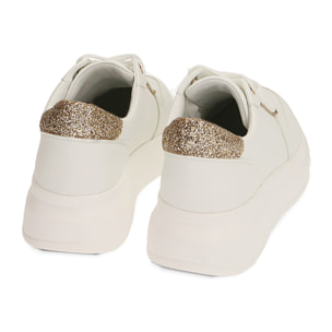 Zapatillas blancas con purpurina