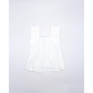 Blusa blanca. Fruncida en la parte superior, con volantes en las sisas.