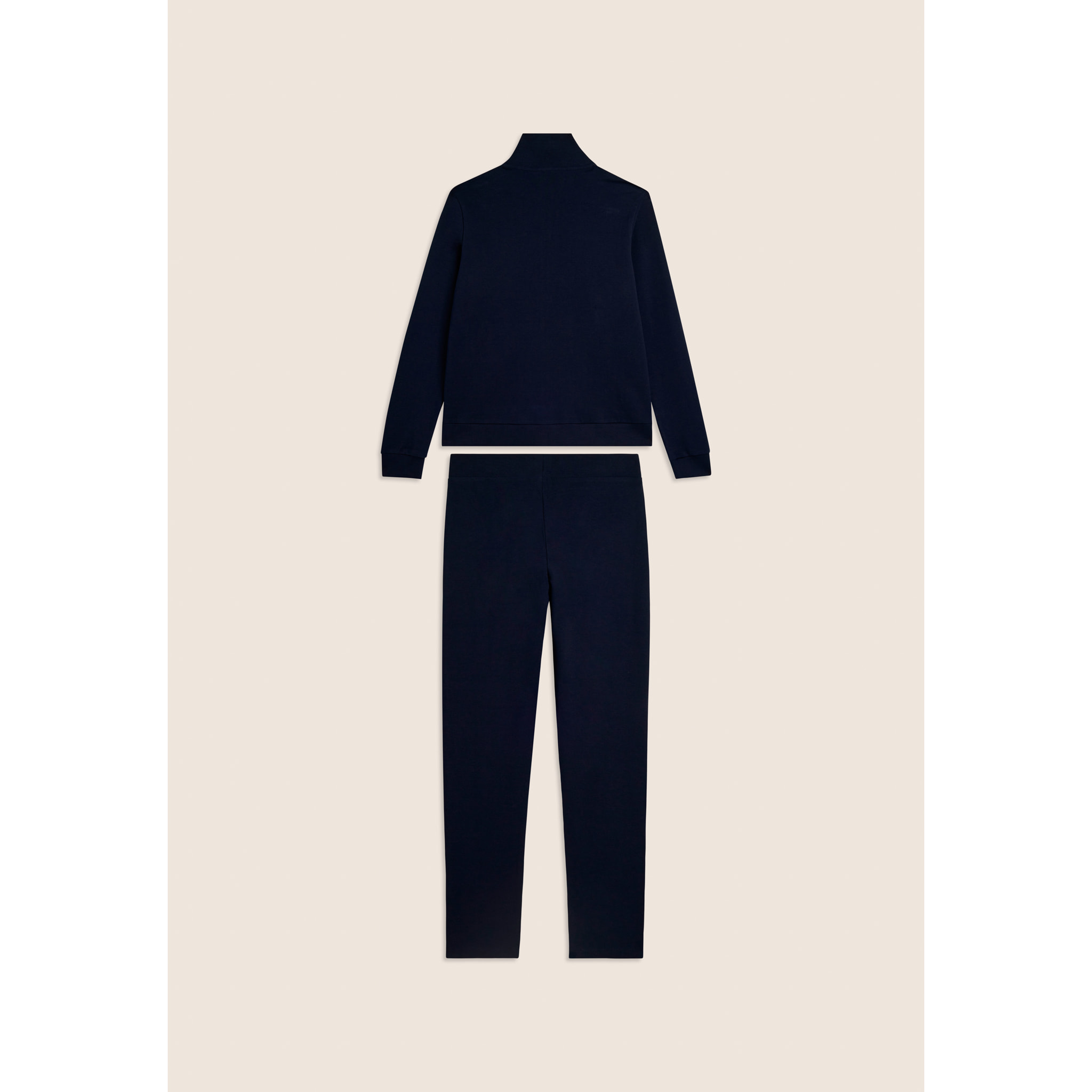 Tuta con zip e collo alto, logo in perline