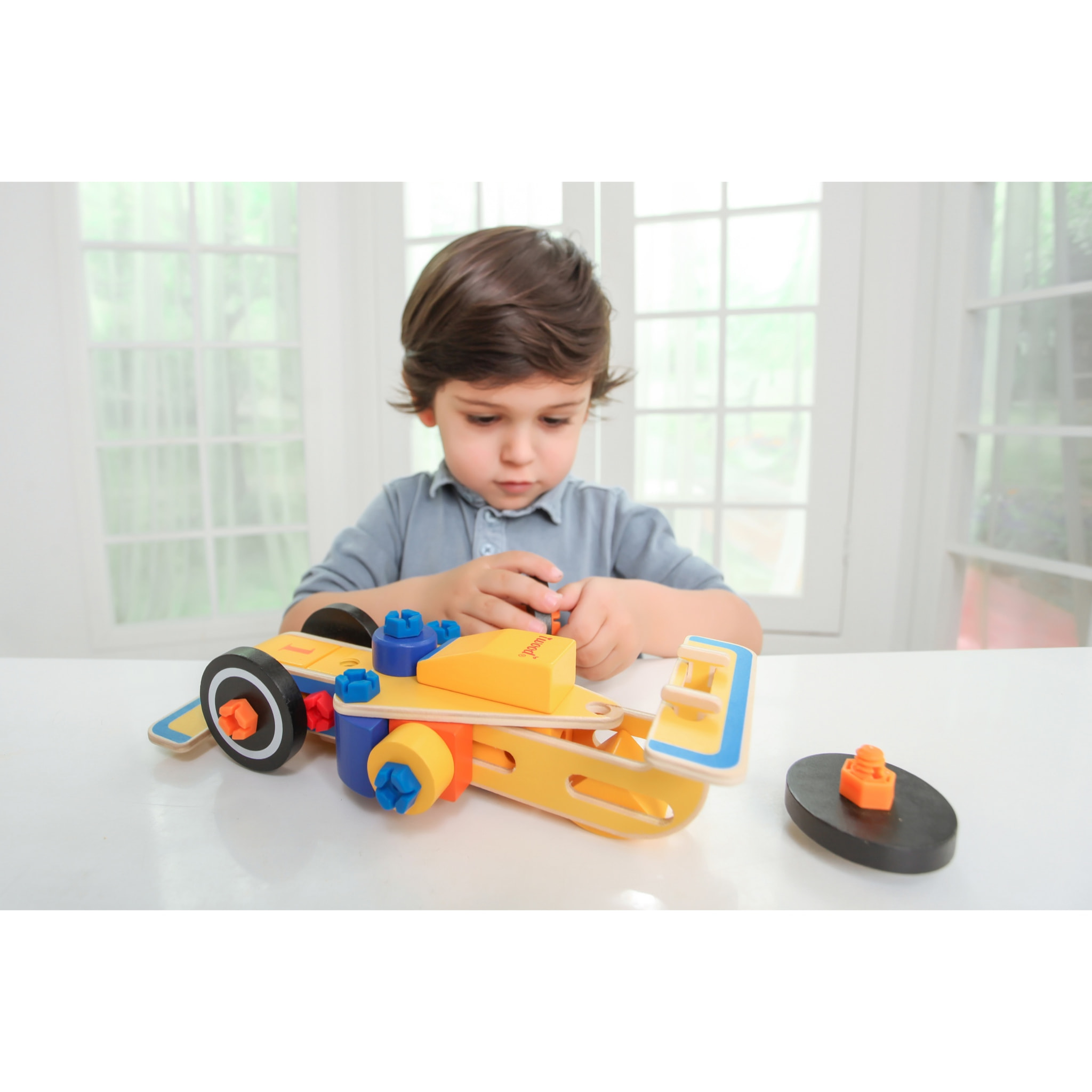 COCHE DE CARRERAS F1 DE CONSTRUCCIÓN (TRANSFORMABLE)