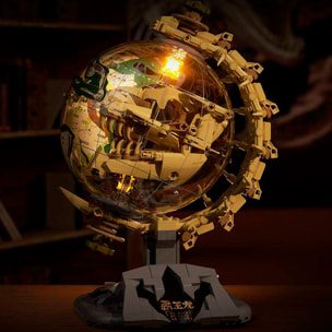 Maqueta educativa 1:8 de dinosaurio T.rex y globo terrestre prehistórico, con rotación 360°, luces y bloques para armar.