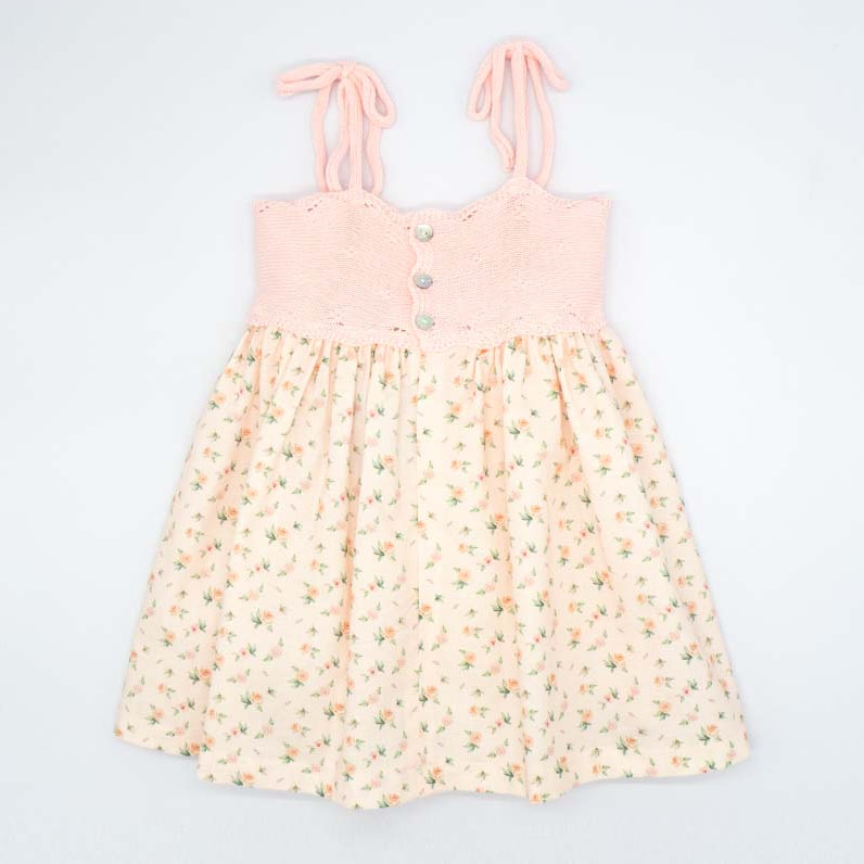 VESTIDO CUERPO DE TRICOT Y FALDA DE FLORES ROSA