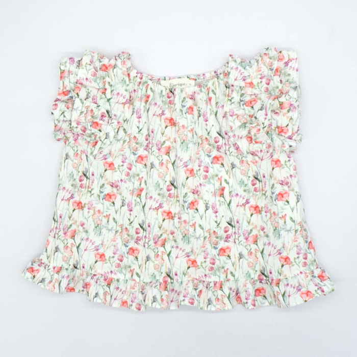 BLUSA CON VOLANTES ESTAMPADA FLORES ROSA