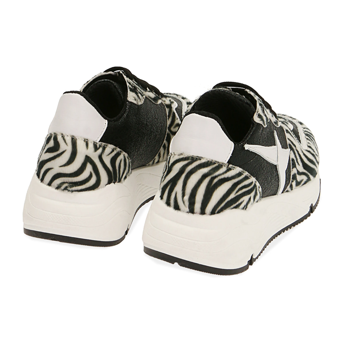 Sneakers nere in pelle stampa cavallino, zeppa 4 cm