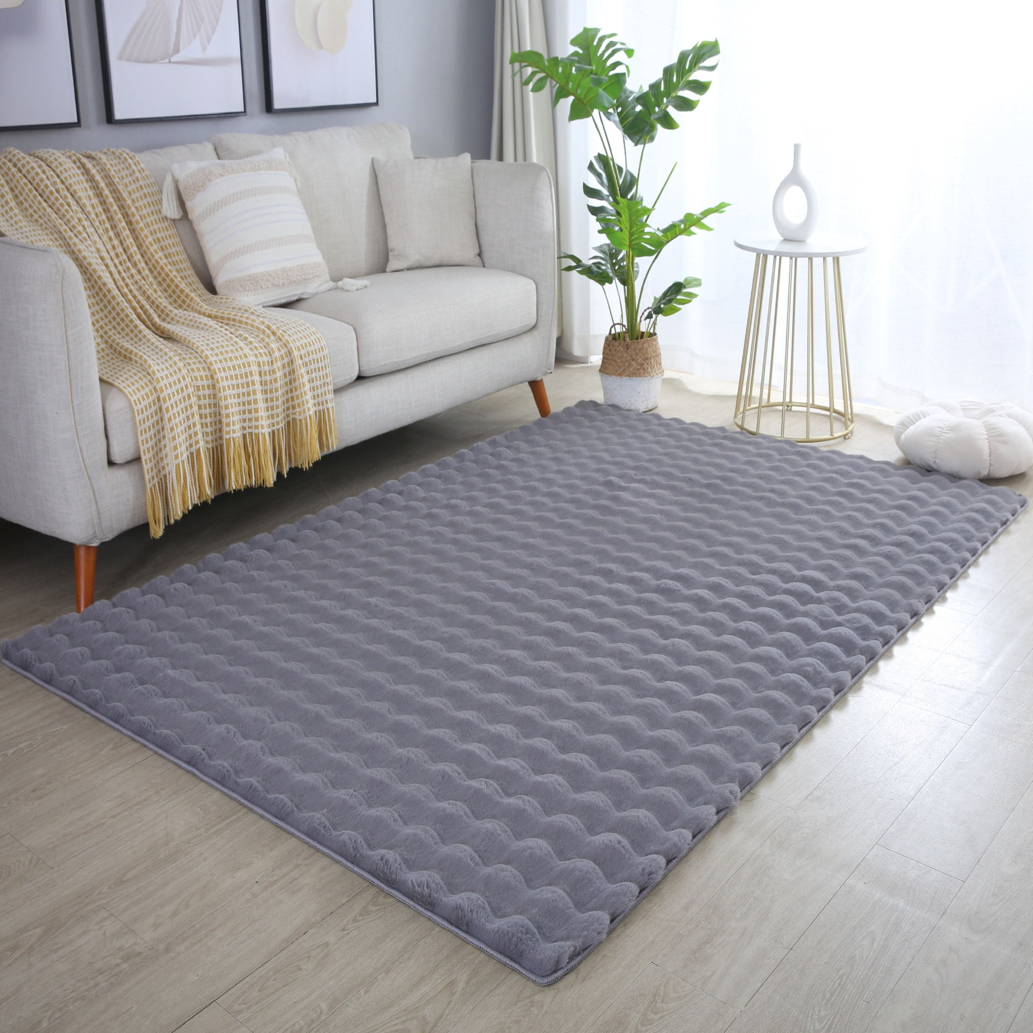 LAPONIE - Tapis uni doux en relief Gris