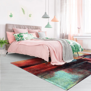 Petit tapis aux motifs multicolores abstraits