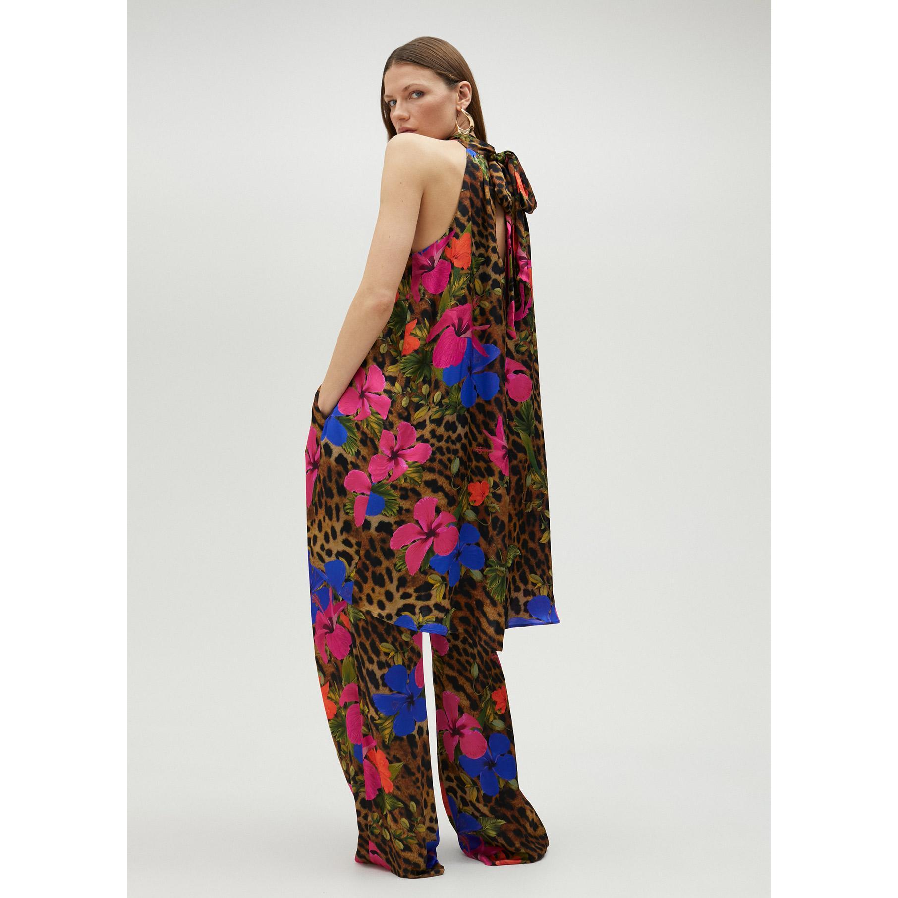 Top voluminoso all'americana con stampa floreale e animalier