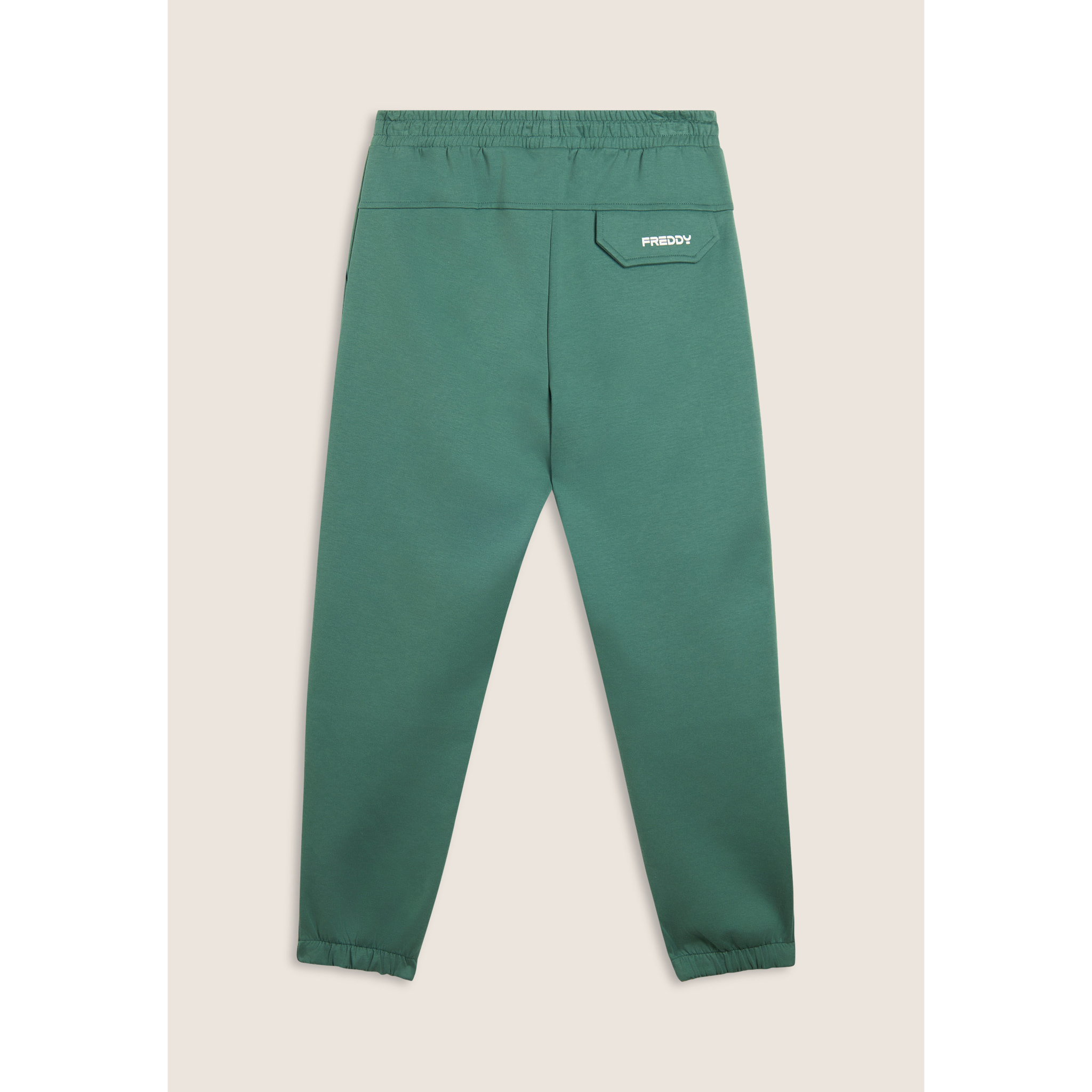 Pantaloni slim in interlock con stampa UT e cuciture
