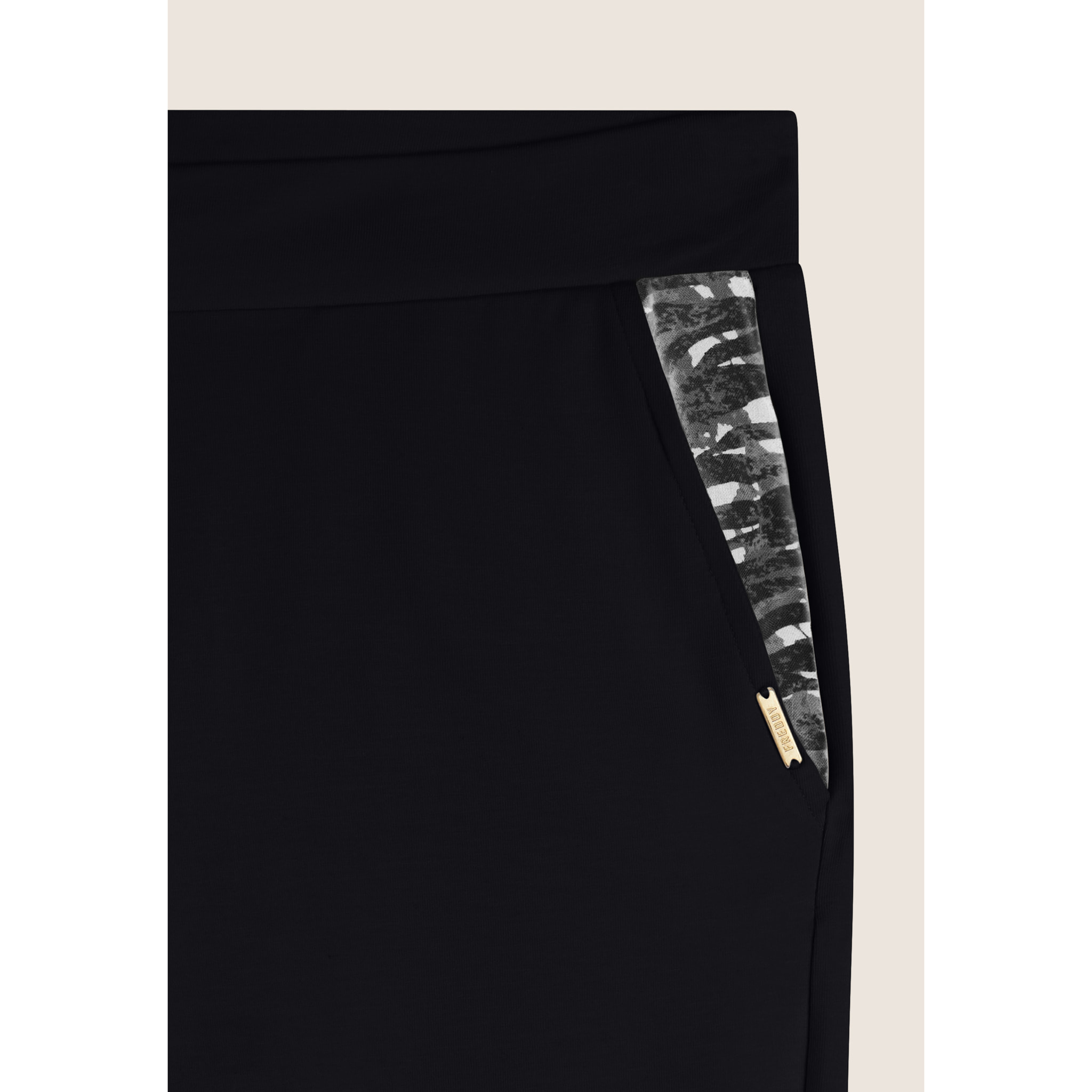 Pantaloni in jersey con apertura tasche animalier
