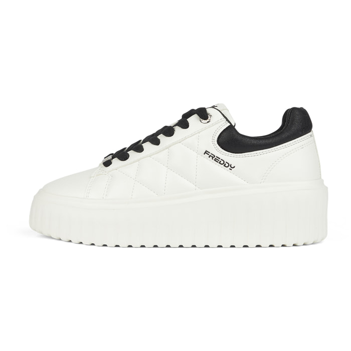 Sneakers in similpelle effetto rettile con suola platform