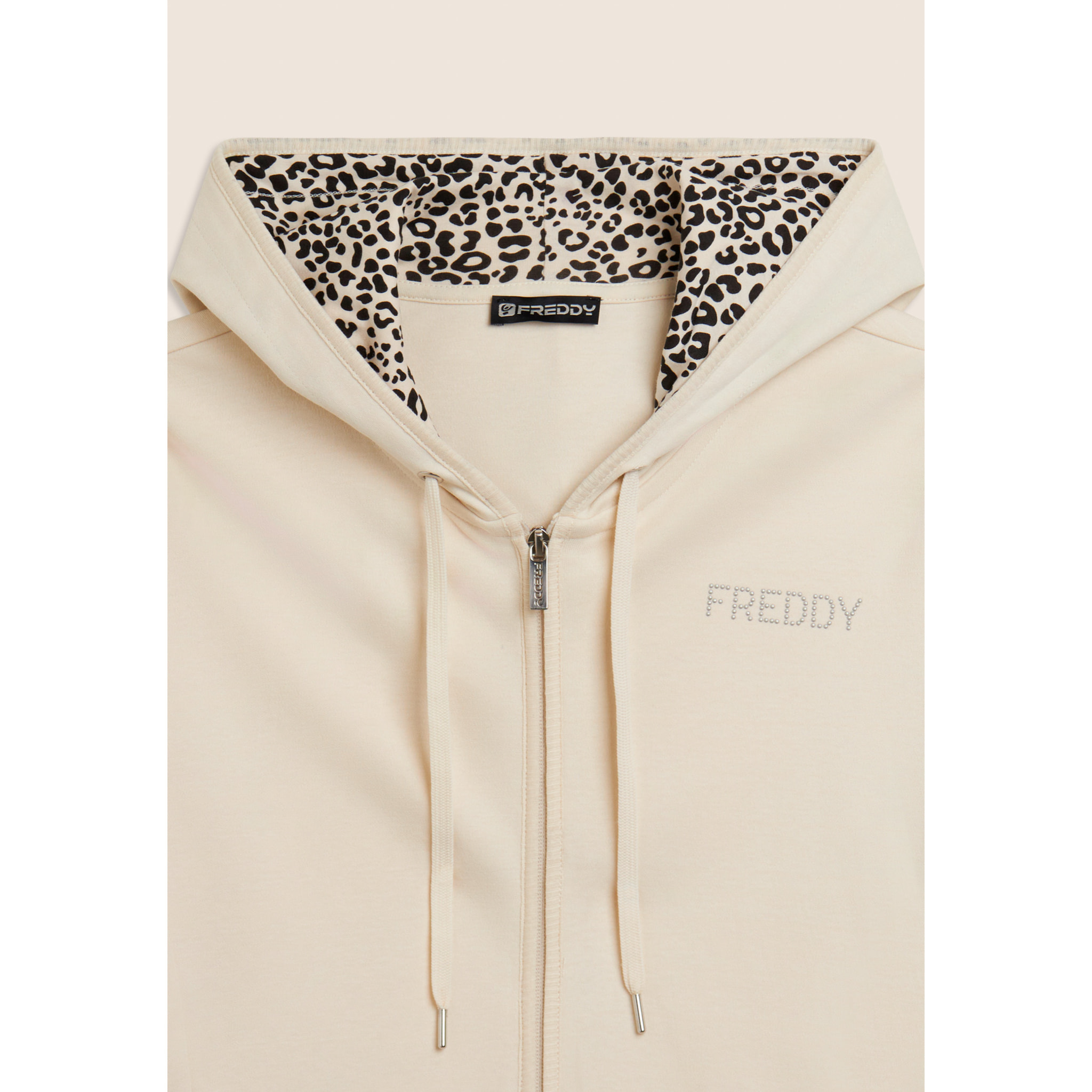 Tuta con zip e cappuccio con interno animalier