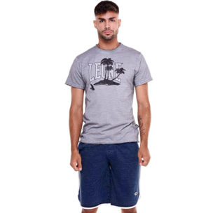 Camiseta hombre efecto desteñido palmera playa