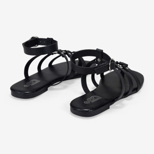 Sandalias planas negras con tira de dedo