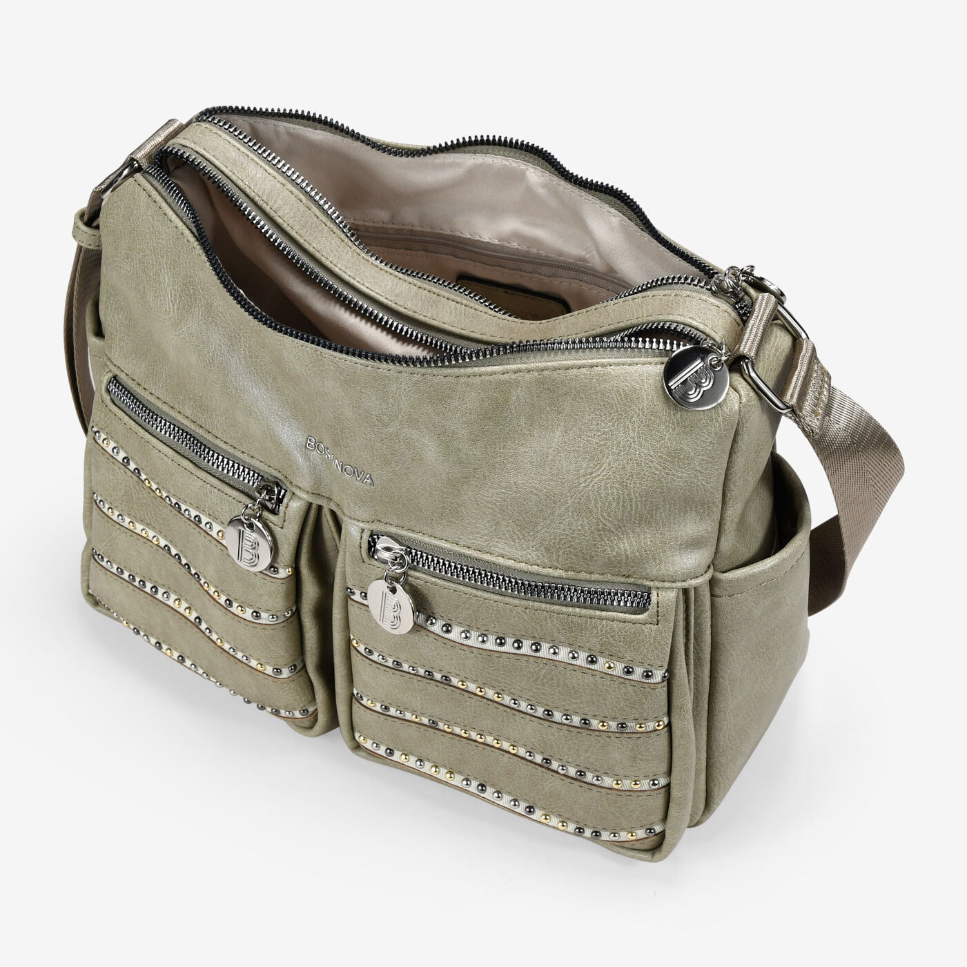 Bolso bandolera verde con bolsillos y tachas