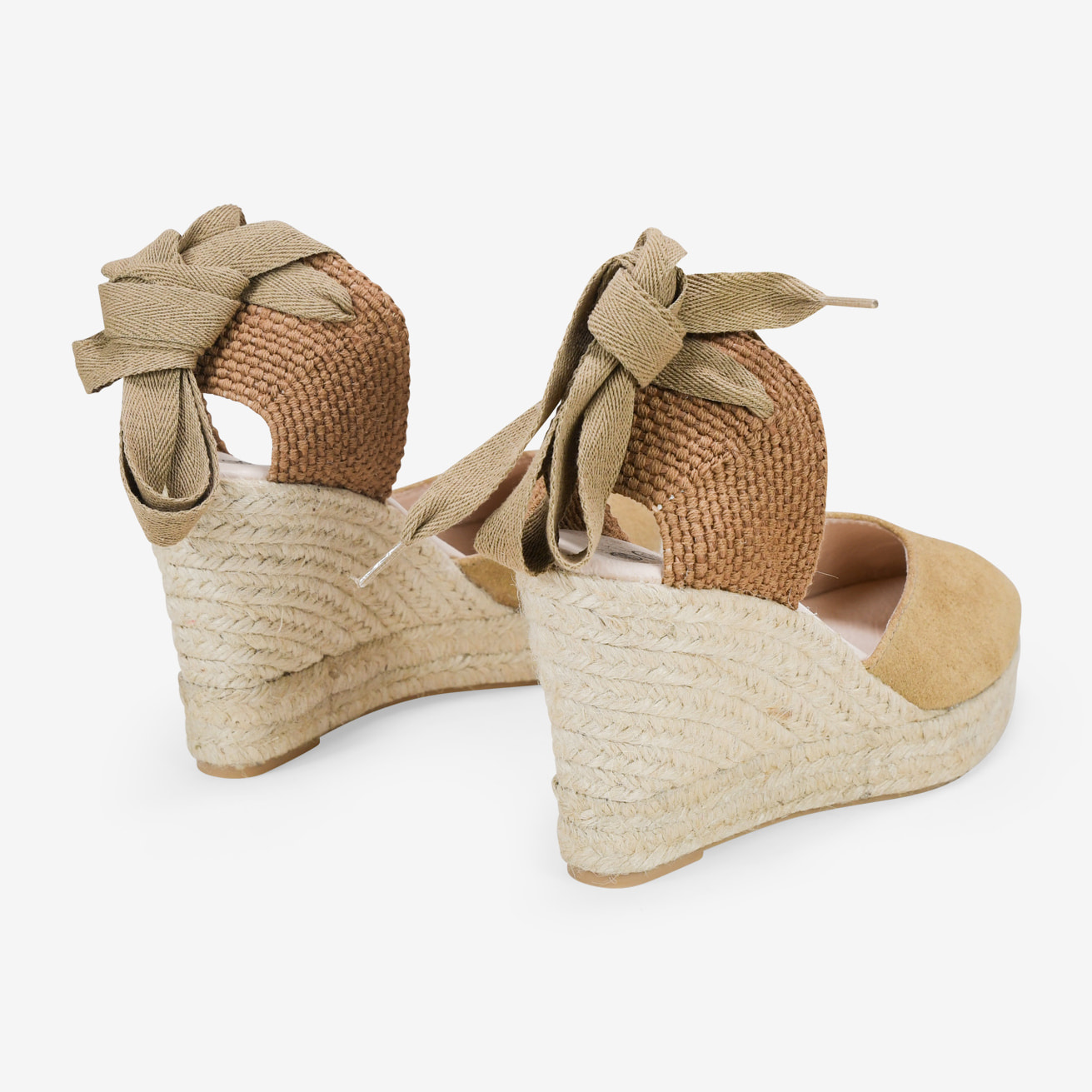 Alpargatas de piel con cuña negras y lazos para atar