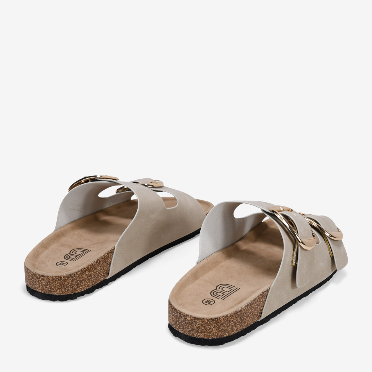 Sandalias planas beige con dos hebillas