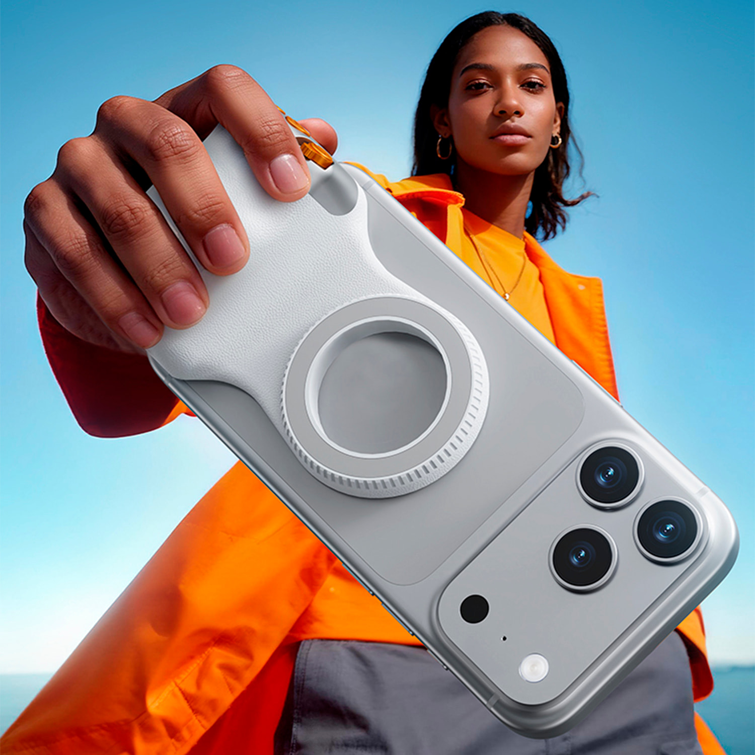 Mango fotográfico magnético para smartphone, control de zoom, botón selfie y disparador. Con conexión Bluetooth y anillo magnético incluido.