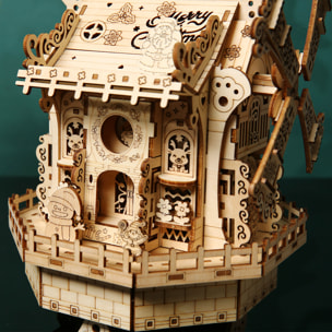 Maqueta de Madera 3D, con movimiento mecánico diseño cabaña élfica con luz y música. 140 piezas.