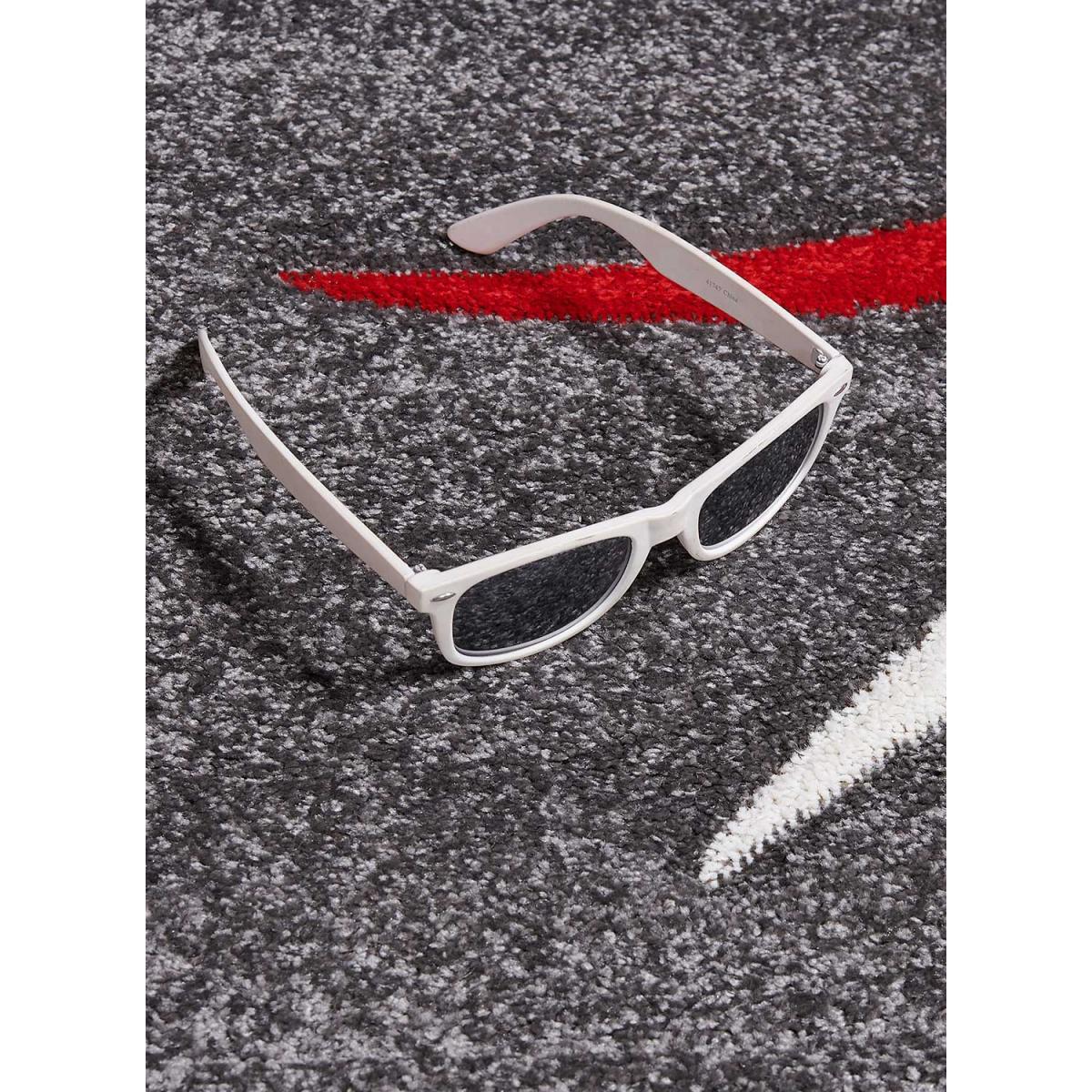 Tapis Tiho, parfaite harmonie entre courbes et angles droits