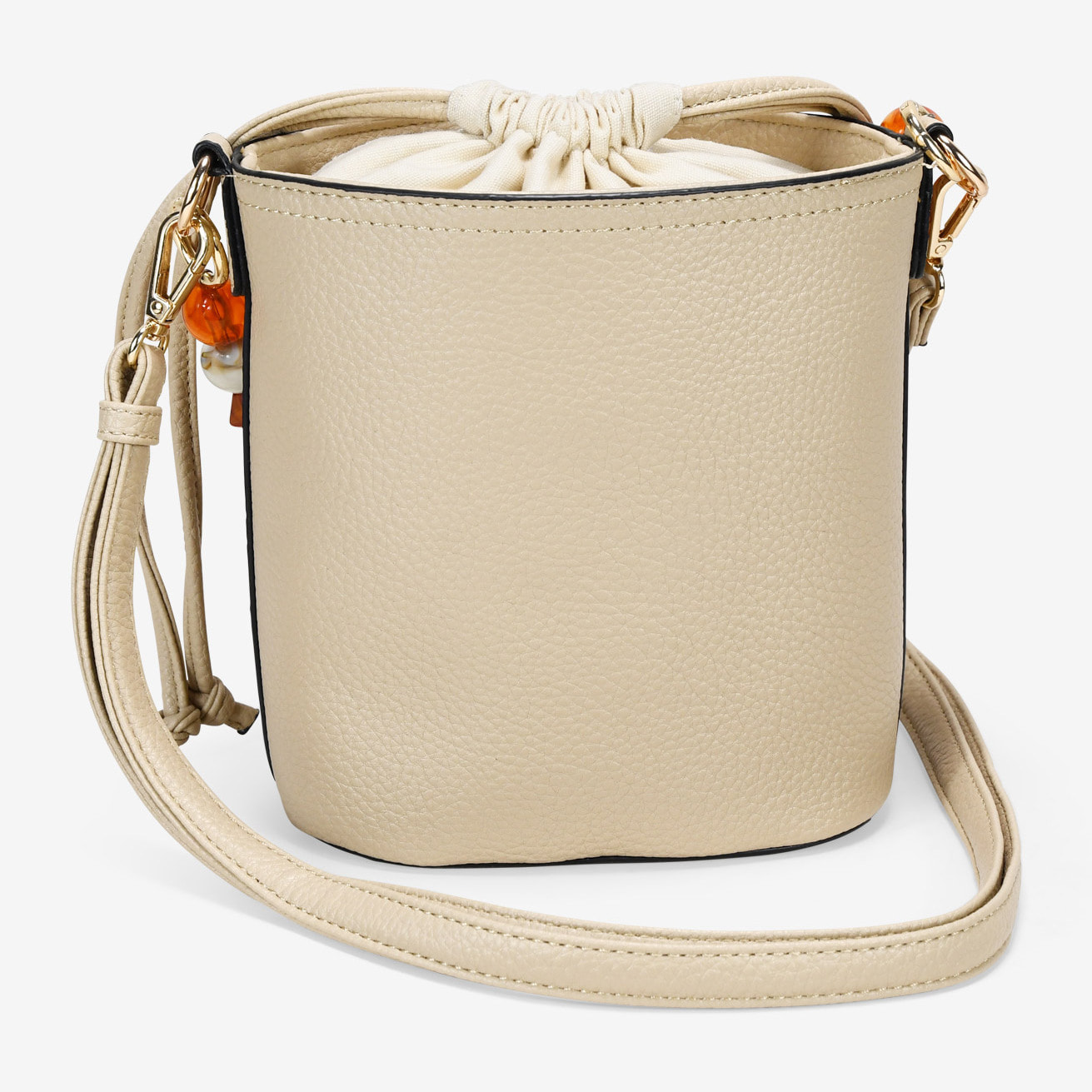 Bolso bandolera beige con asa de piedras