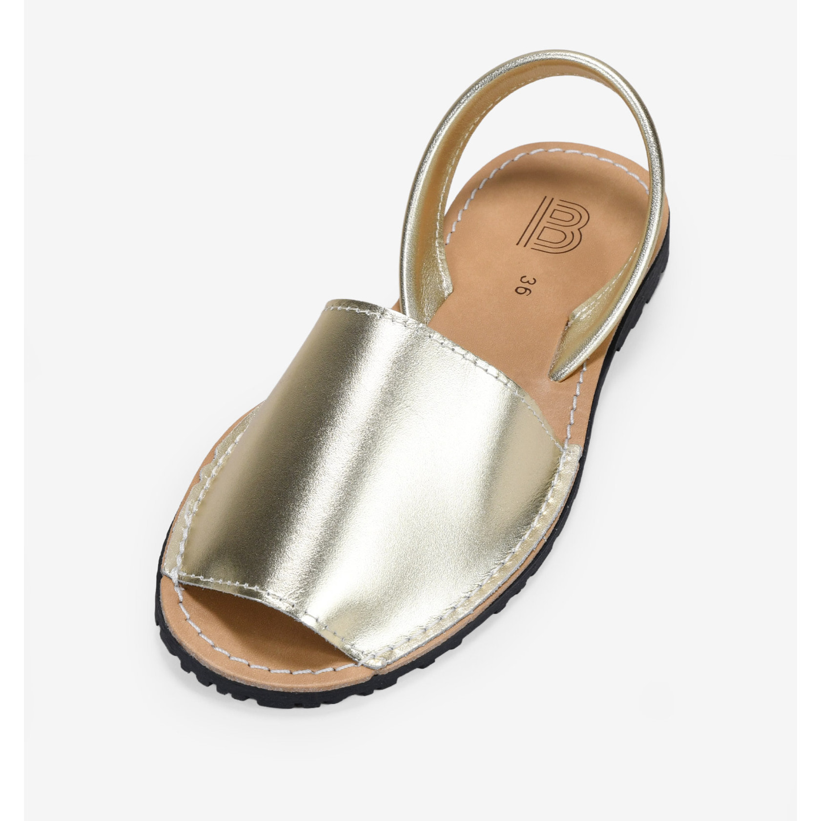 Abarcas planas en piel dorada