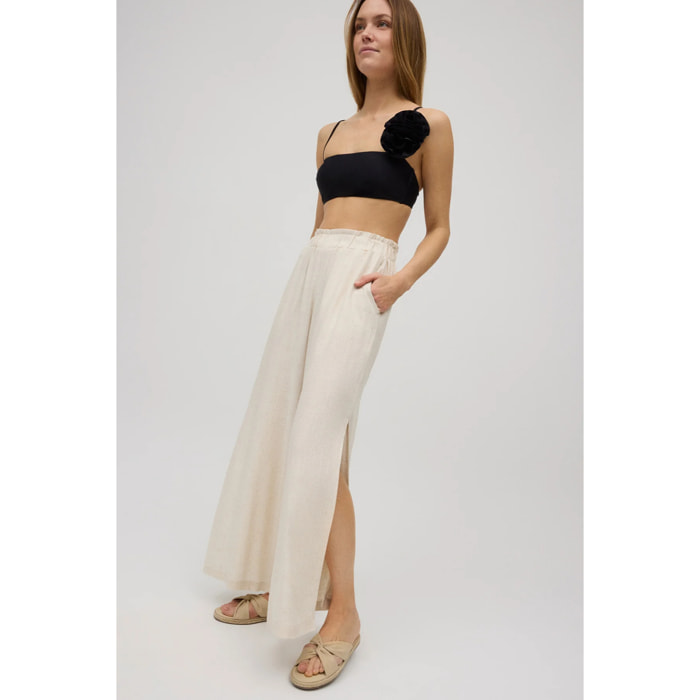 Pantaloni in lino a gamba larga con apertura