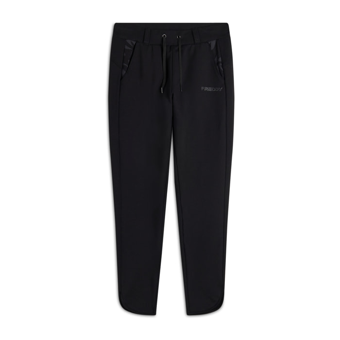 Pantaloni donna slim fit in felpa con apertura sul fondo
