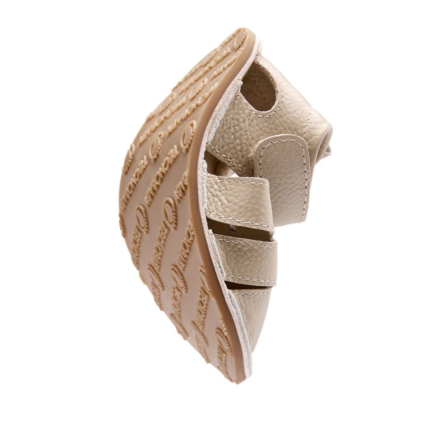 Eleganti sandali chiusi per neonati, di colore beige.