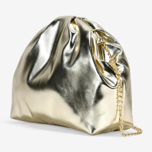 Bolso de mano dorado con boquilla